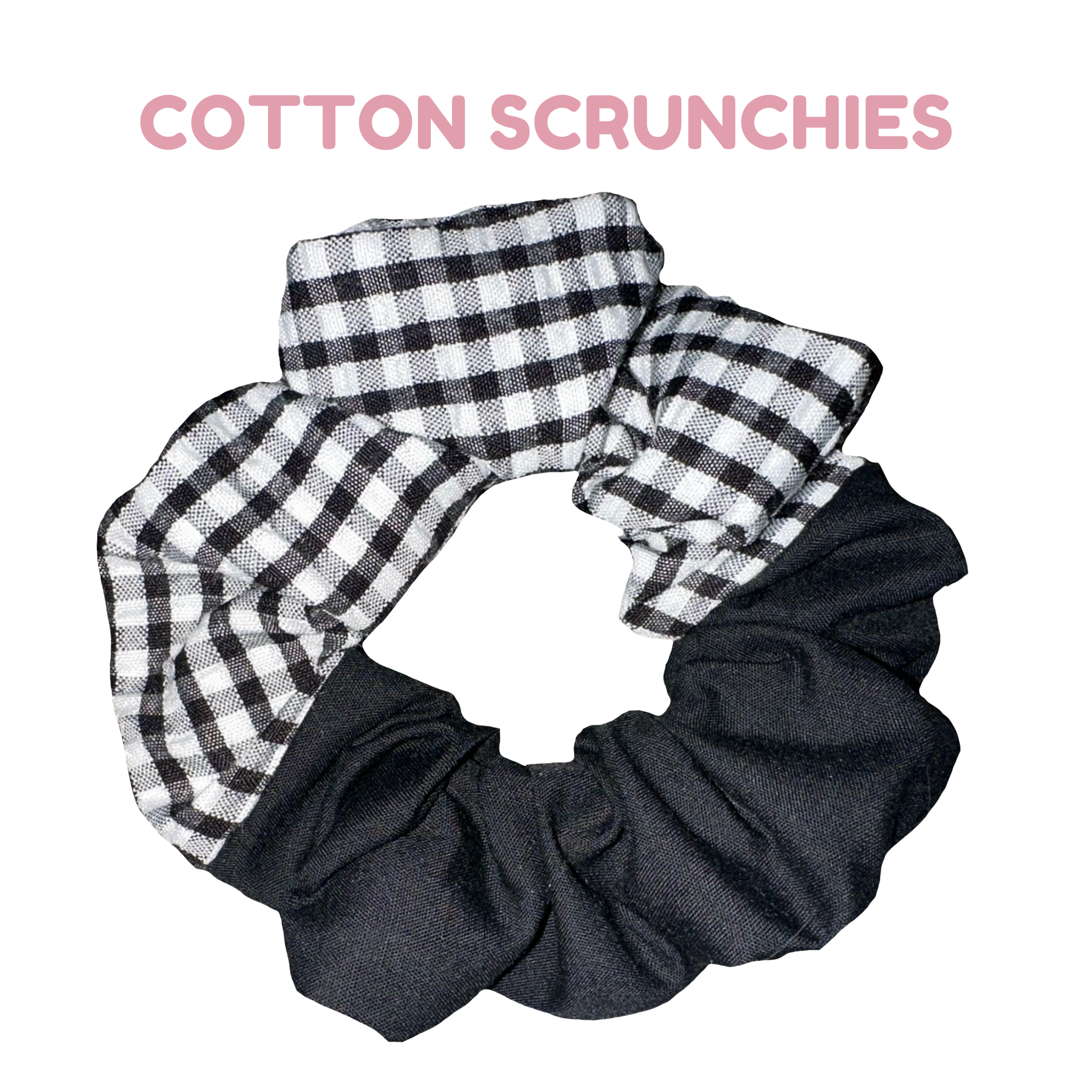 A scrunchie which is made up of half black gingham (small check) and black fabric.