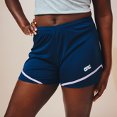 Eleven as One blue football shorts. They have white detailing and a white logo.