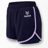 Maiden Cricket Fine Leg shorts in navy blue with purple logo and trim.