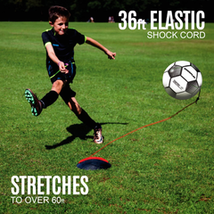 Child playing football with a 36ft elastic shock cord on a grass field