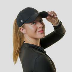 The Magni-Strip® Lifestyle Cap Black on woman's head