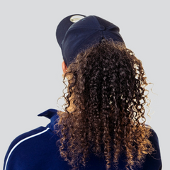 The Magni-Strip® Lifestyle Cap Navy being worn from back