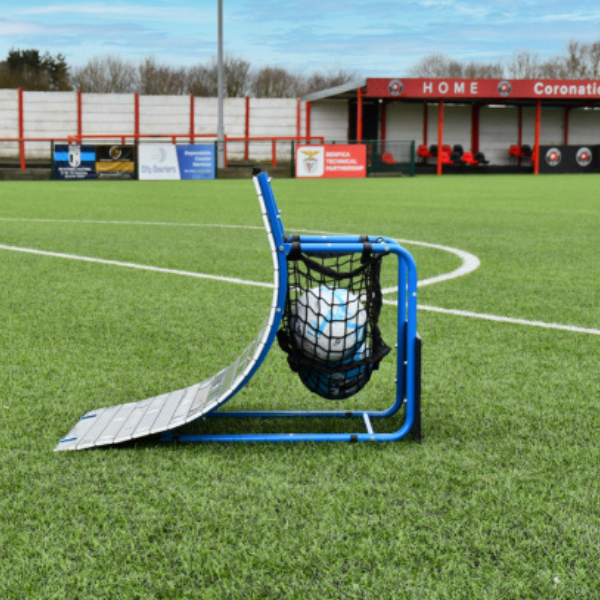Football skills trainer equipment with a ball on a grass field