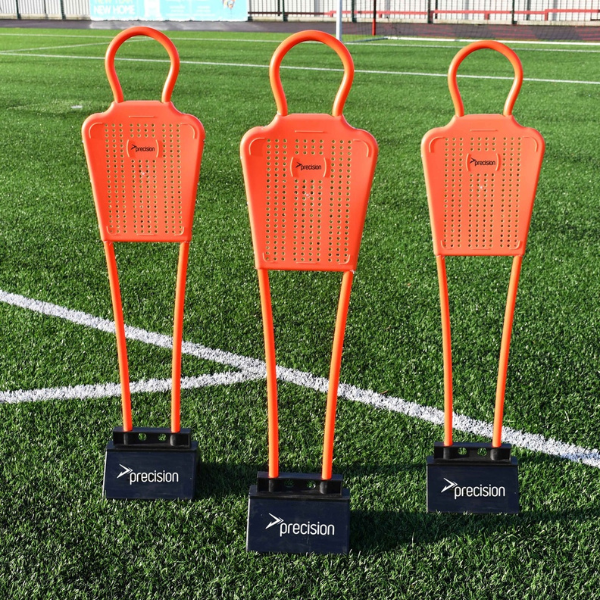 Three orange precision mini football training mannequins with black bases