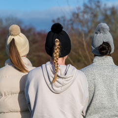 Three people wearing Magni-Strip® Bobble Hat Grey outdoors