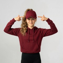 Woman wearing Versatail Berry Red cap