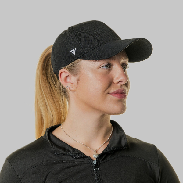 Woman wearing The Magni-Strip® Lifestyle Cap Black