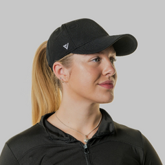 Woman wearing The Magni-Strip® Lifestyle Cap Black