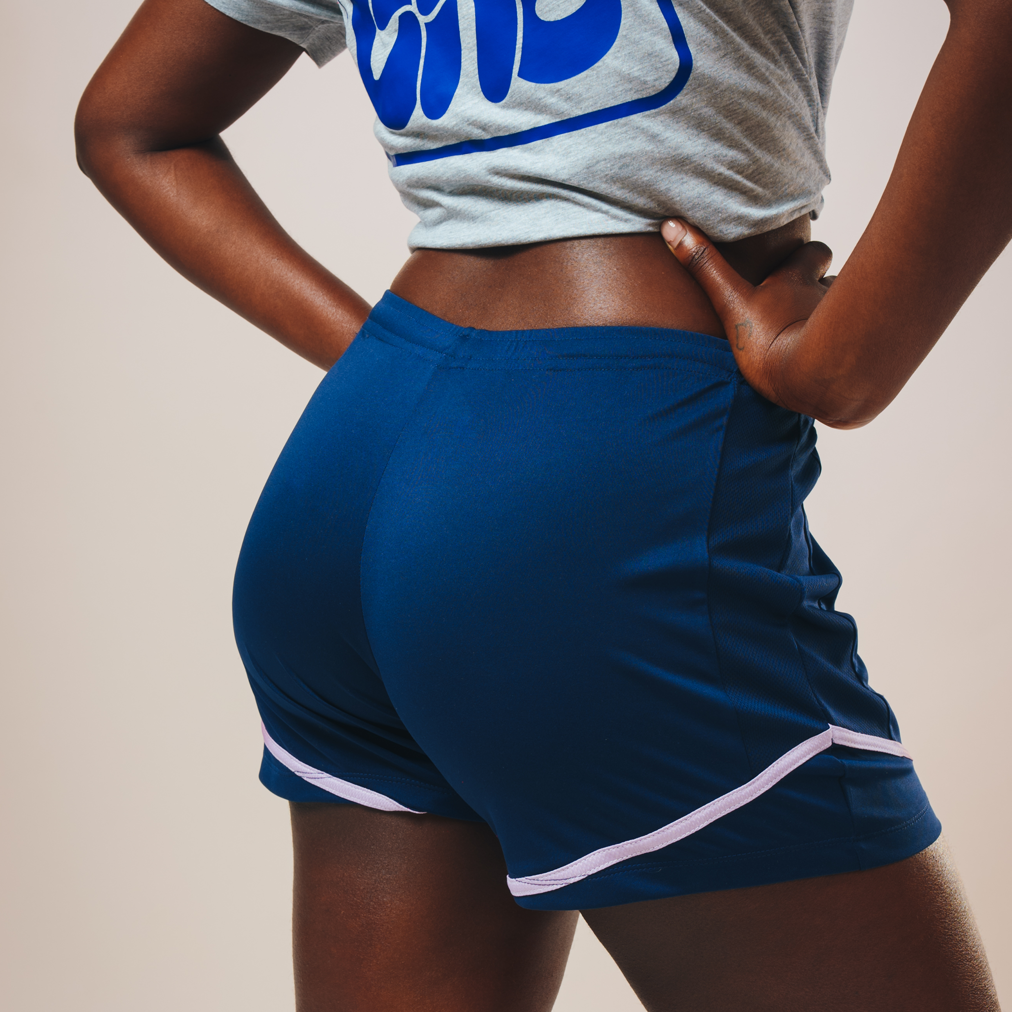 A rear image of the Eleven as One football shorts showing the side panels and white trim. 