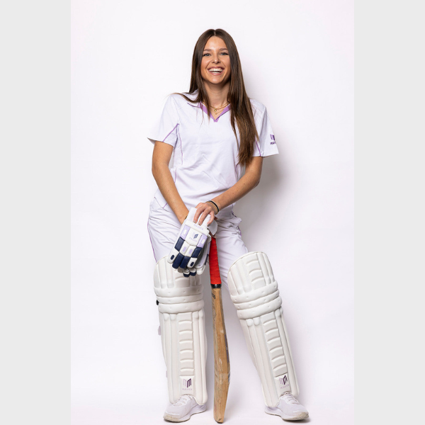 Maiden white cricket pads on person