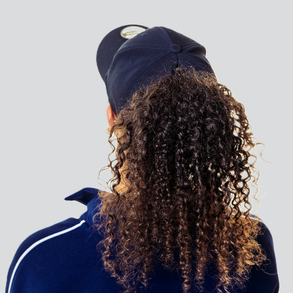The Magni-Strip® Lifestyle Cap Navy being worn from back