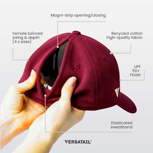 Versatail Berry Red cap held by a hand with features labeled