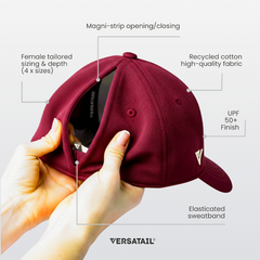 Versatail Berry Red cap held by a hand with features labeled