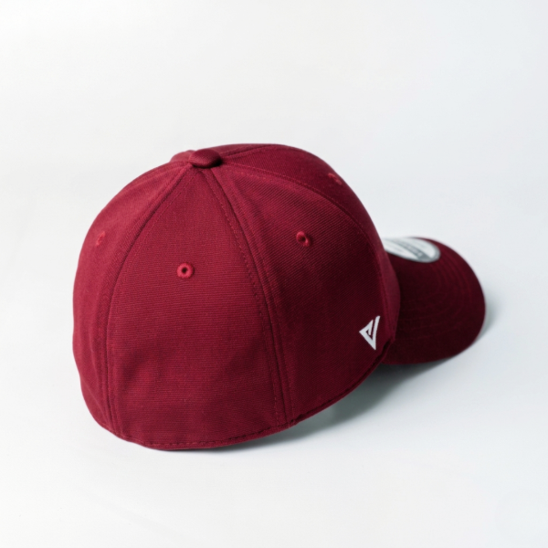 Versatail Berry Red cap with a logo on a white background