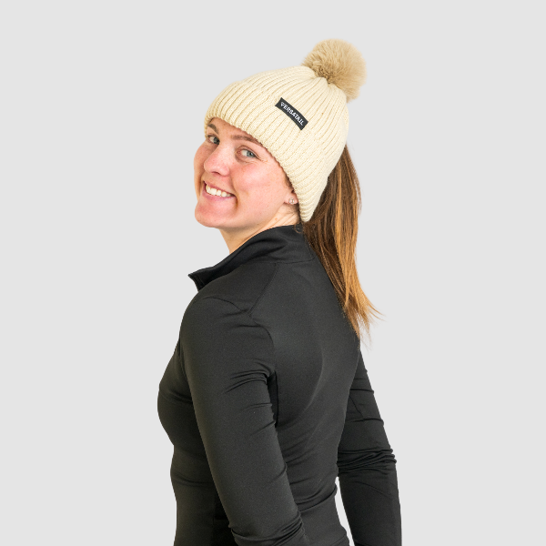 Person wearing The Magni-Strip® Bobble Hat Beige